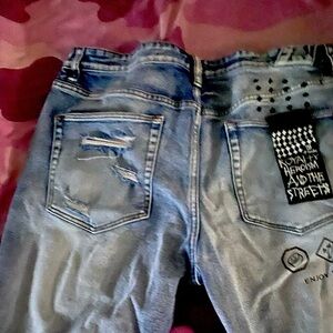 Distressed Blue Jeans with Graphic Patch